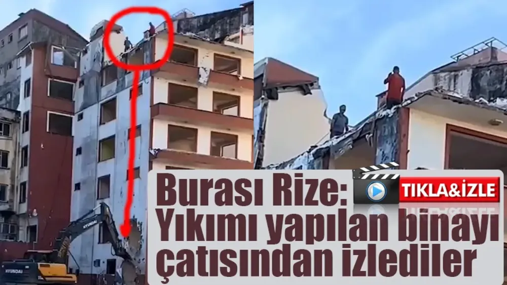 Yıkımı yapılan binayı çatısından izlediler